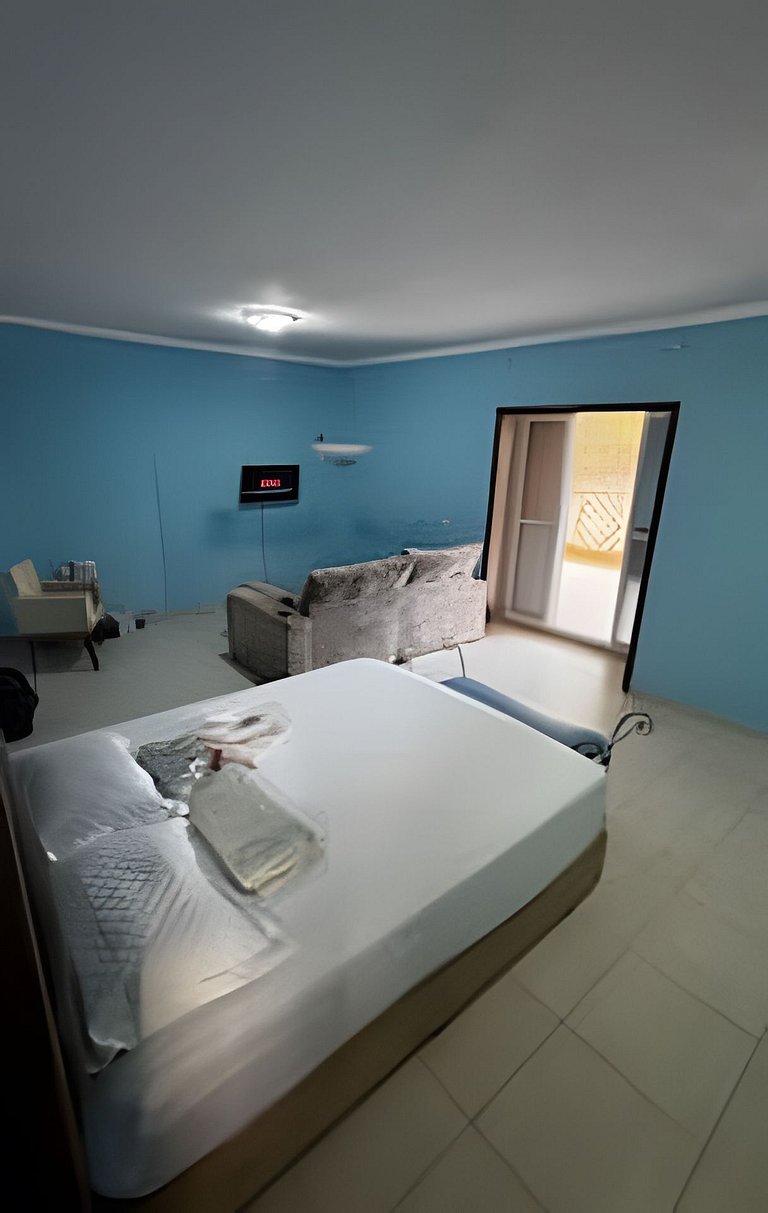 Suíte Espaçosa SmarTV, Cama Queen e Varanda